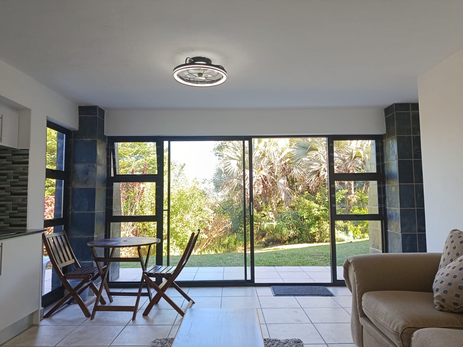 Sliding doors opening from the lounge onto the garden