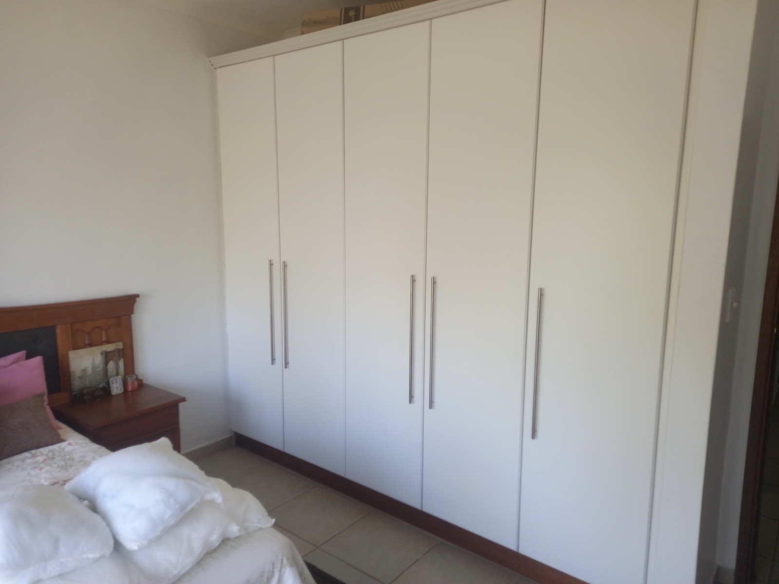 Full-height built-in wardrobes in the main bedroom