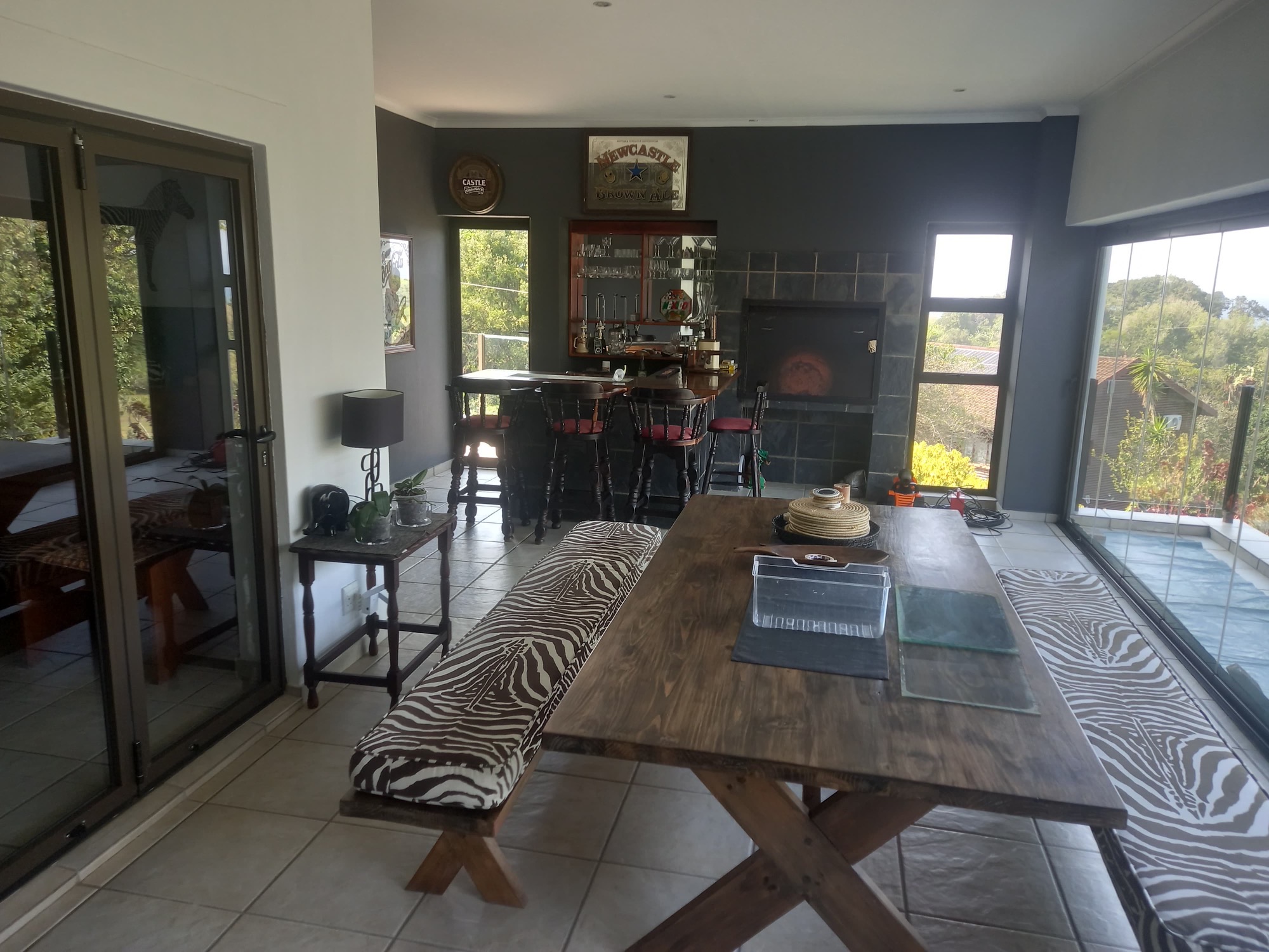 The dining room with its built-in bar and indoor braai
